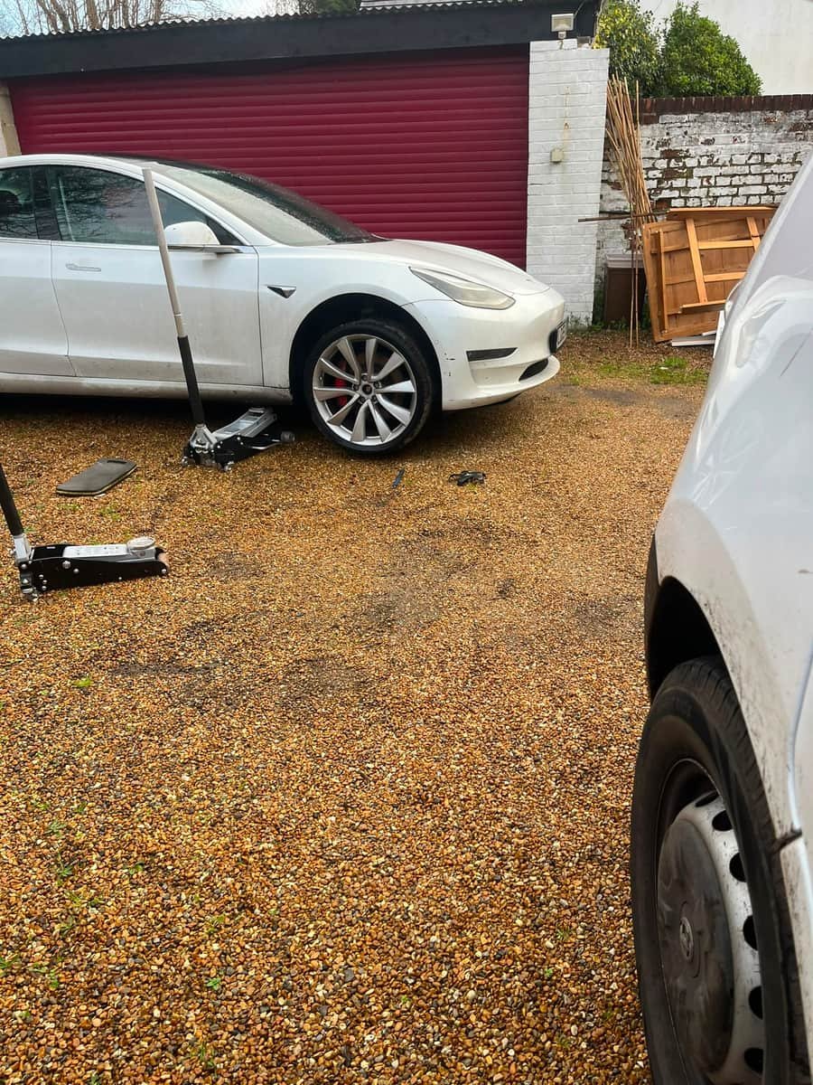 Mobile tyre fitting on a Tesla Model 3 on a customer's driveway